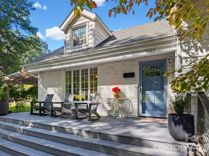 5145 Murrayhill Drive, Charlotte, NC 28210.  MLS# CAR4434043, YatesRealty ID 56955. Rocking chair front porch