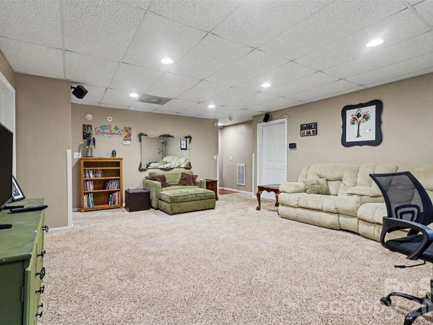 5221 Turkey Oak Drive, Mint Hill, NC 28227.  MLS# CAR4433763, YatesRealty ID 56962. Basement Great Room