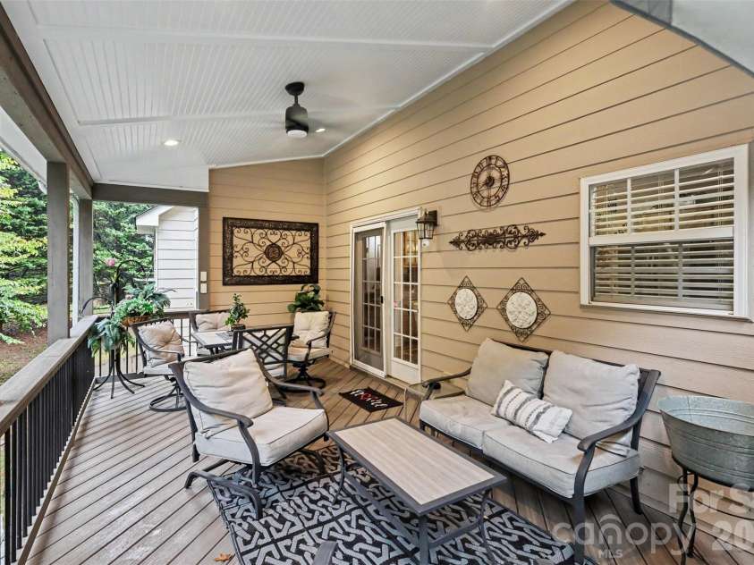 5221 Turkey Oak Drive, Mint Hill, NC 28227.  MLS# CAR4433763, YatesRealty ID 56962. Covered Back Porch