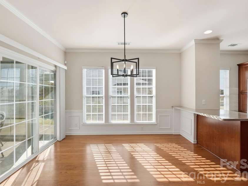 2047 Sweetleaf Drive, Indian Land, SC 29707.  MLS# CAR4433737, YatesRealty ID 56964. Dining Area opens to 3-Season Room