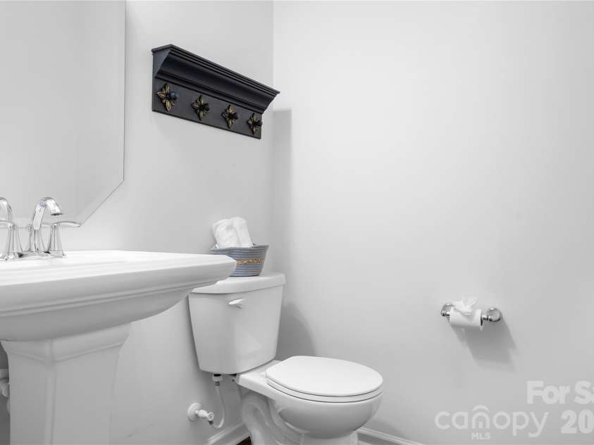 117 Abel Peterson Drive, Mount Holly, NC 28120.  MLS# CAR4433396, YatesRealty ID 56976. First floor Powder room