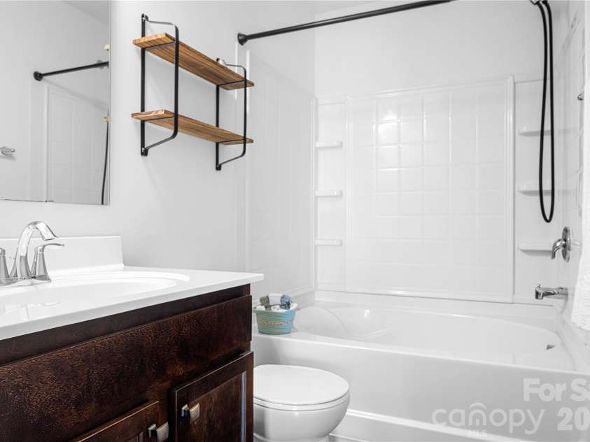 117 Abel Peterson Drive, Mount Holly, NC 28120.  MLS# CAR4433396, YatesRealty ID 56976. Guest bathroom