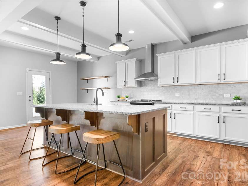 117 Abel Peterson Drive, Mount Holly, NC 28120.  MLS# CAR4433396, YatesRealty ID 56976. Kitchen view to breakfast nook