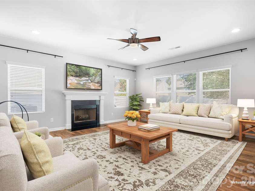 117 Abel Peterson Drive, Mount Holly, NC 28120.  MLS# CAR4433396, YatesRealty ID 56976. Living room - virtually staged