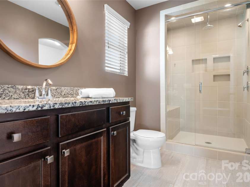 117 Abel Peterson Drive, Mount Holly, NC 28120.  MLS# CAR4433396, YatesRealty ID 56976. Master bathroom with stand-up shower