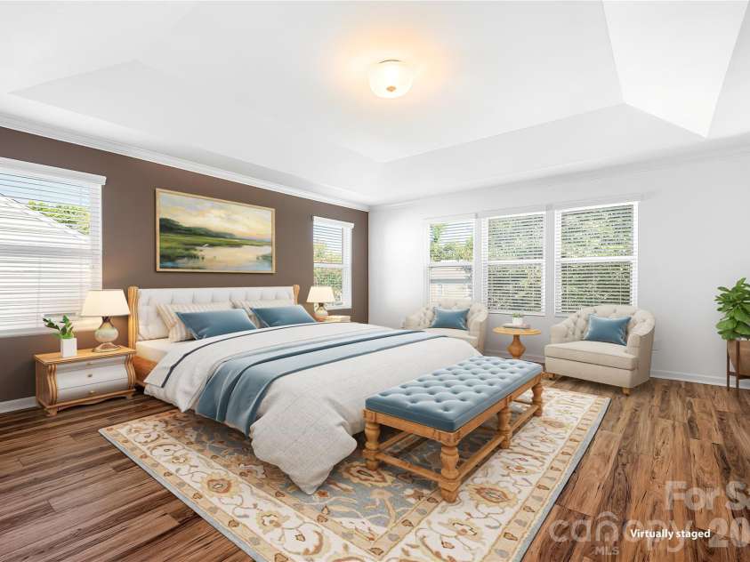 117 Abel Peterson Drive, Mount Holly, NC 28120.  MLS# CAR4433396, YatesRealty ID 56976. Master bedroom virtually staged