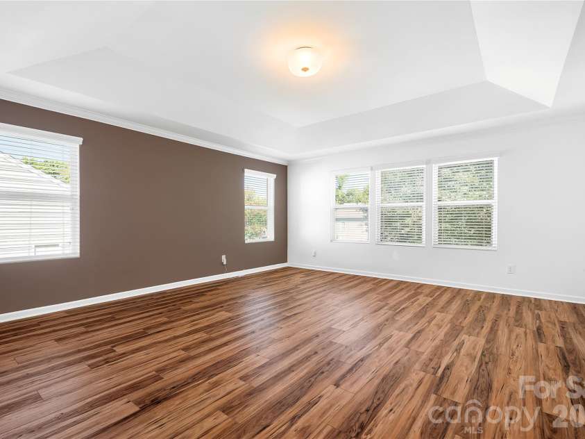 117 Abel Peterson Drive, Mount Holly, NC 28120.  MLS# CAR4433396, YatesRealty ID 56976. Master bedroom with tray ceiling