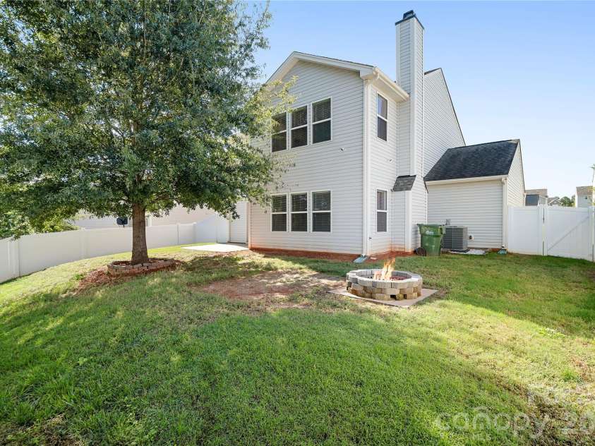 117 Abel Peterson Drive, Mount Holly, NC 28120.  MLS# CAR4433396, YatesRealty ID 56976. Privacy fenced backyard