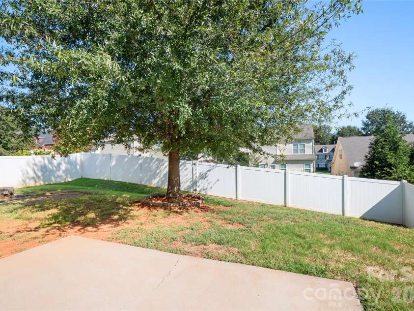 117 Abel Peterson Drive, Mount Holly, NC 28120.  MLS# CAR4433396, YatesRealty ID 56976. Privacy fenced backyard