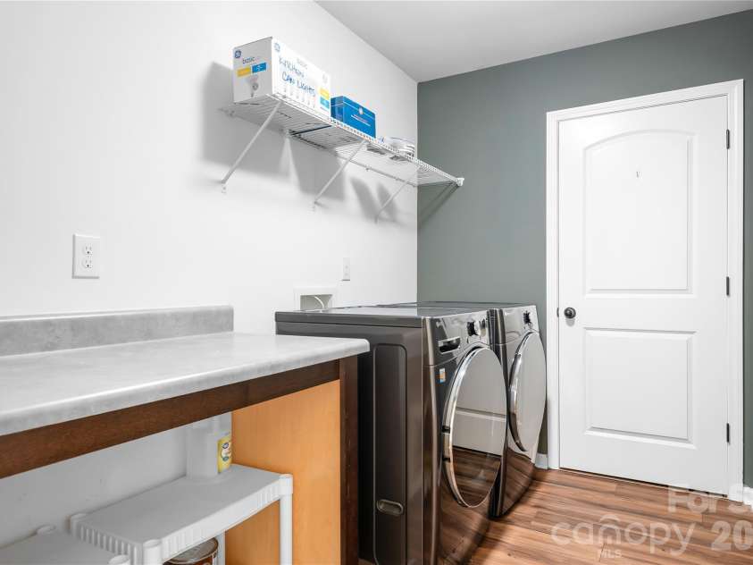 117 Abel Peterson Drive, Mount Holly, NC 28120.  MLS# CAR4433396, YatesRealty ID 56976. Upstairs laundry