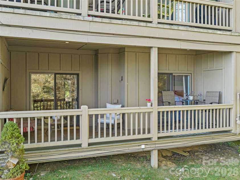 2521 Wolf Laurel Road, Mars Hill, NC 28754.  MLS# CAR4432909, YatesRealty ID 56984. Large private covered porch