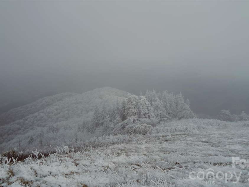 2521 Wolf Laurel Road, Mars Hill, NC 28754.  MLS# CAR4432909, YatesRealty ID 56984. Scenic winter snowfalls