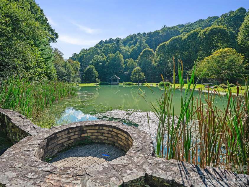 2521 Wolf Laurel Road, Mars Hill, NC 28754.  MLS# CAR4432909, YatesRealty ID 56984. Trout Pond