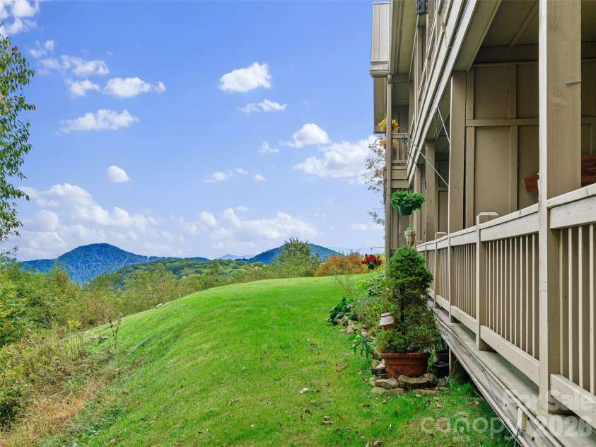 2521 Wolf Laurel Road, Mars Hill, NC 28754.  MLS# CAR4432909, YatesRealty ID 56984. Year round long range views
