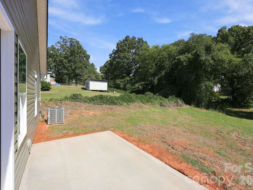 808 4th Street, Albemarle, NC 28001.  MLS# CAR4432385, YatesRealty ID 56988. Back Patio