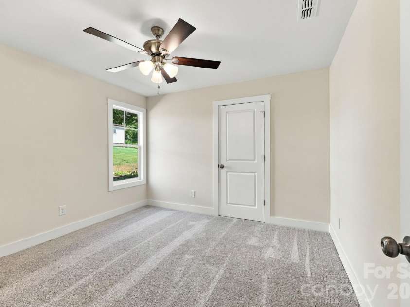 808 4th Street, Albemarle, NC 28001.  MLS# CAR4432385, YatesRealty ID 56988. Bedroom 2