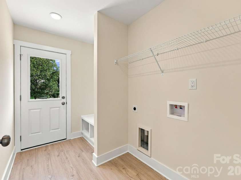 808 4th Street, Albemarle, NC 28001.  MLS# CAR4432385, YatesRealty ID 56988. Laundry Room with exit to back patio.