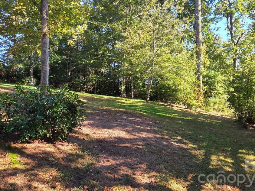 52 Enochs Way Way, Fletcher, NC 28732.  MLS# CAR4432358, YatesRealty ID 56989. .76 acre