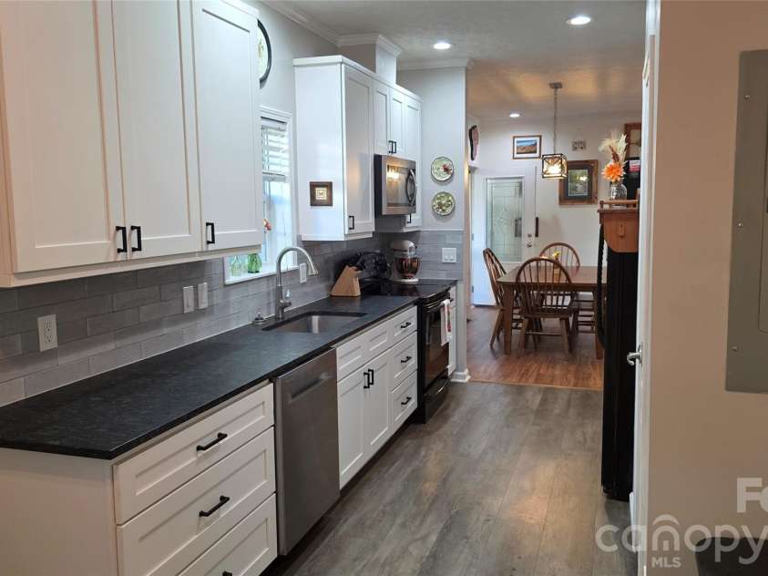 52 Enochs Way Way, Fletcher, NC 28732.  MLS# CAR4432358, YatesRealty ID 56989. Electrical Box