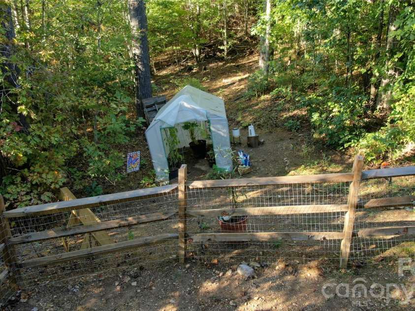 52 Enochs Way Way, Fletcher, NC 28732.  MLS# CAR4432358, YatesRealty ID 56989. Greenhouse For Growing your Vegetables