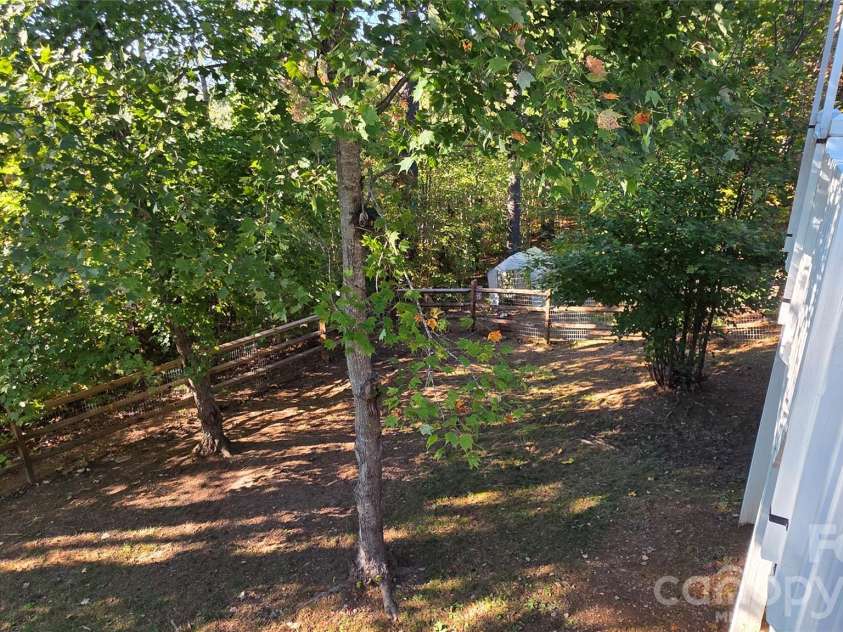 52 Enochs Way Way, Fletcher, NC 28732.  MLS# CAR4432358, YatesRealty ID 56989. Large Back Yard