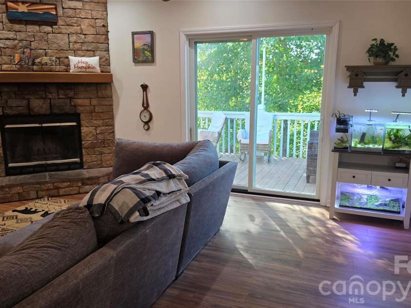 52 Enochs Way Way, Fletcher, NC 28732.  MLS# CAR4432358, YatesRealty ID 56989. So Cozy by the fireplace