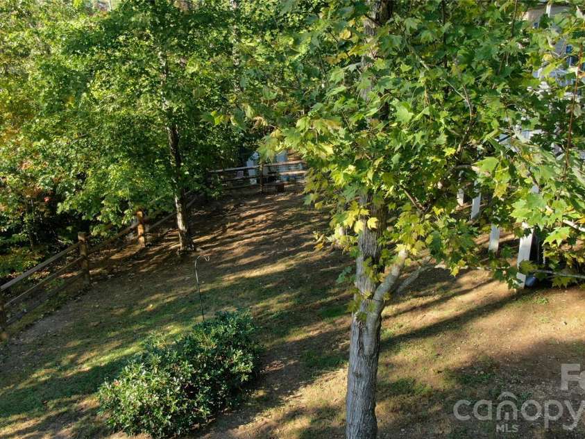 52 Enochs Way Way, Fletcher, NC 28732.  MLS# CAR4432358, YatesRealty ID 56989. Your Back Yard