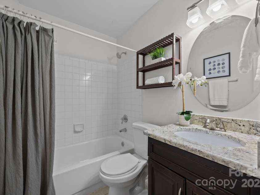 907 Southwest Drive, Davidson, NC 28036.  MLS# CAR4312461, YatesRealty ID 5699. Guest bathroom