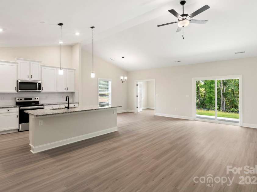 114 Tradesmen Trail, Troutman, NC 28166.  MLS# CAR4326102, YatesRealty ID 570. Kitchen & family room