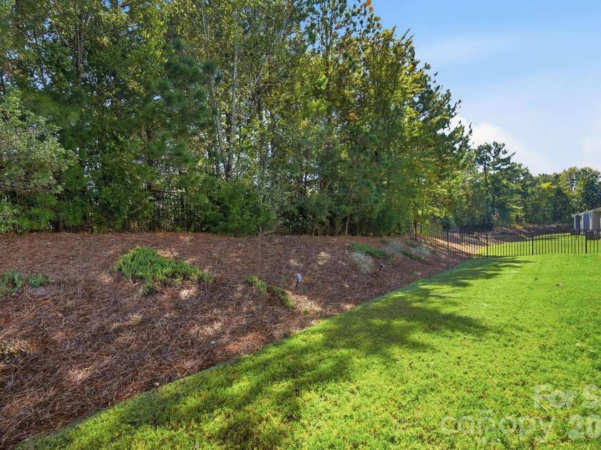 2014 Old Evergreen Parkway, Indian Trail, NC 28079.  MLS# CAR4433757, YatesRealty ID 57036. Private Backyard