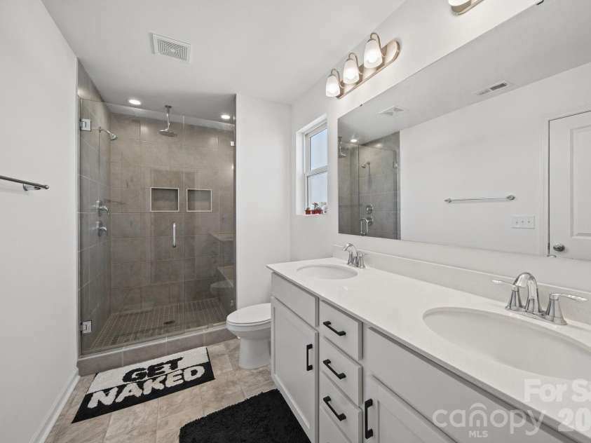 6332 Rocky Wagon Lane, Concord, NC 28025.  MLS# CAR4426776, YatesRealty ID 57039. Primary en-suite Bath