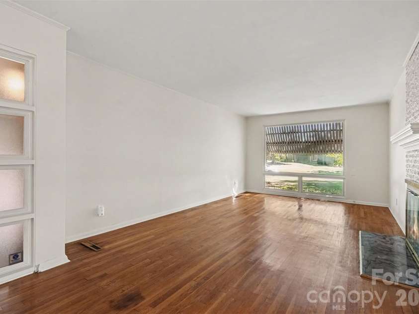 708 Montford Drive, Charlotte, NC 28209.  MLS# CAR4433725, YatesRealty ID 57040. Living Room
