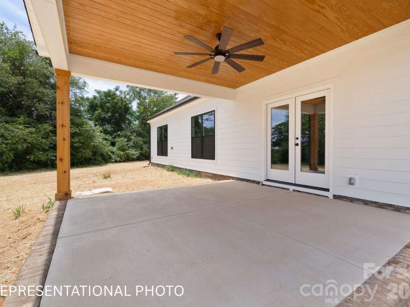 1052 Baylor Grove Road, Monroe, NC 28112.  MLS# CAR4434119, YatesRealty ID 57055. Covered Back Porch