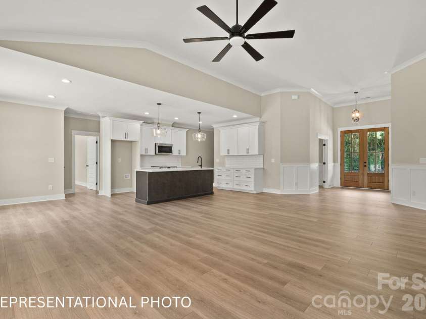 1052 Baylor Grove Road, Monroe, NC 28112.  MLS# CAR4434119, YatesRealty ID 57055. Kitchen and Living Room