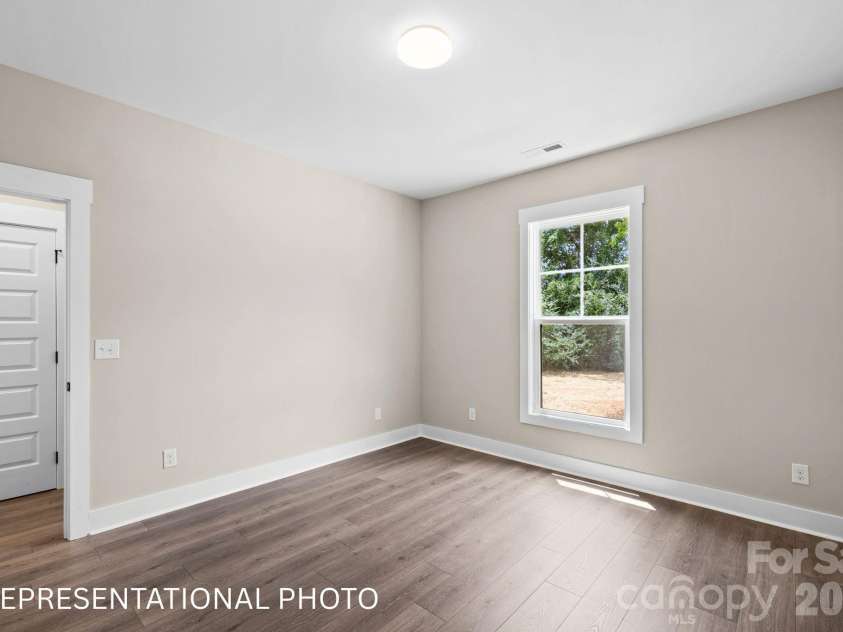 1052 Baylor Grove Road, Monroe, NC 28112.  MLS# CAR4434119, YatesRealty ID 57055. Secondary Bedroom 2
