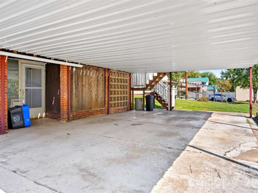 606 A Rutherford Road, Marion, NC 28752.  MLS# CAR4429588, YatesRealty ID 57079. Carport below deck