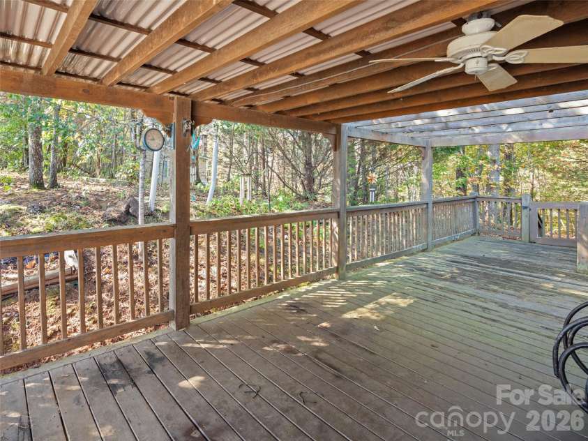 115 Sleepy Forest Drive, Leicester, NC 28748.  MLS# CAR4433809, YatesRealty ID 57083. Covered back deck