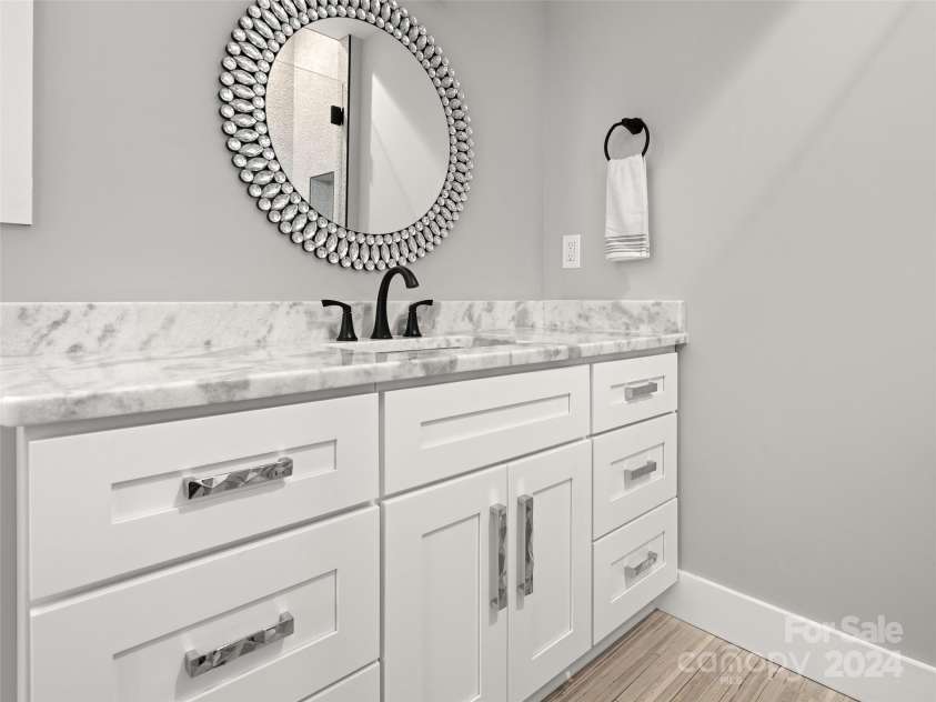 345 Preservation Trail, Columbus, NC 28722.  MLS# CAR4077956, YatesRealty ID 571. Ensuite Bath Lower Level with walk in shower
