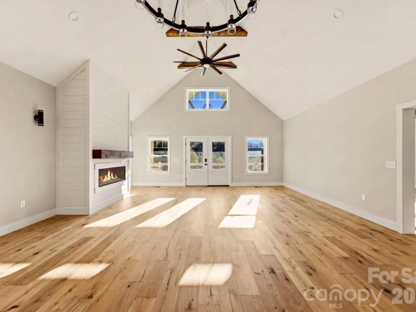 431 Tahlfield Road, Sylva, NC 28779.  MLS# CAR4380590, YatesRealty ID 57101. Great Room - Facing Front Porch