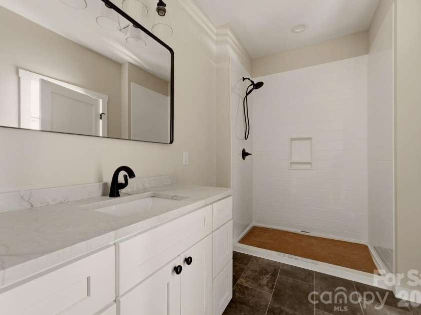 431 Tahlfield Road, Sylva, NC 28779.  MLS# CAR4380590, YatesRealty ID 57101. Upstairs Bathroom