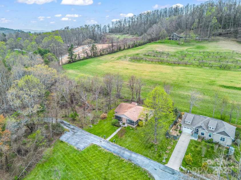 154 Freedom Road, Hendersonville, NC 28782.  MLS# CAR4243481, YatesRealty ID 5711. 