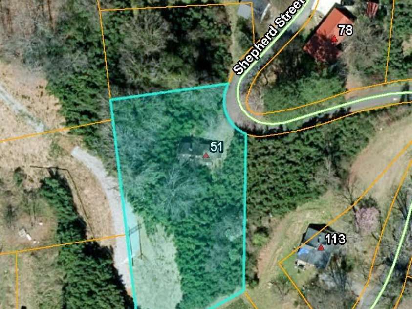 51 Shepherd Street, Tryon, NC 28782.  MLS# CAR4434123, YatesRealty ID 57136. Aerial