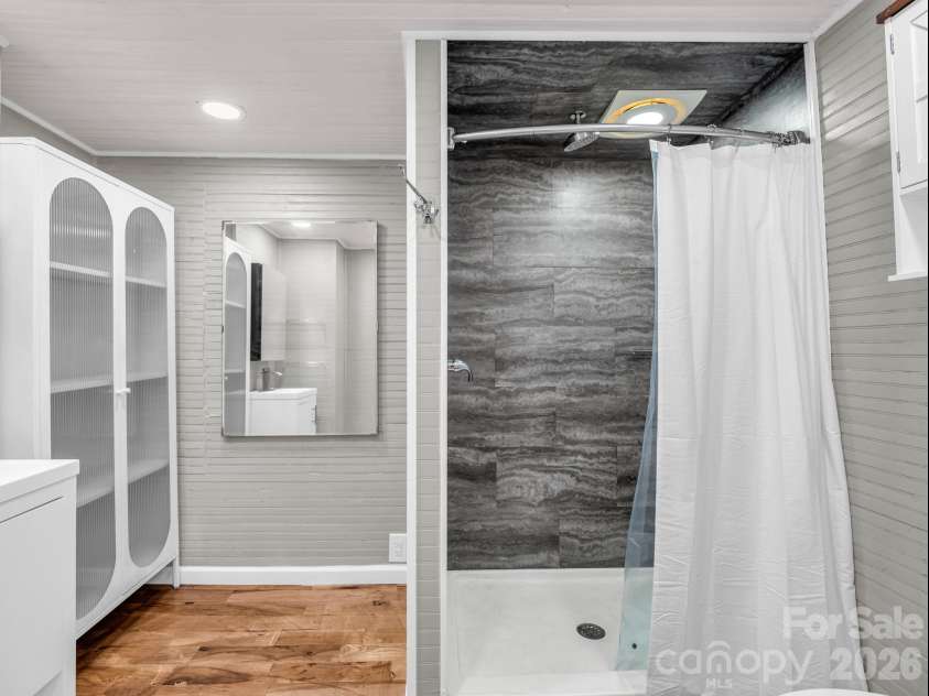 51 Shepherd Street, Tryon, NC 28782.  MLS# CAR4434123, YatesRealty ID 57136. Bathroom with shower
