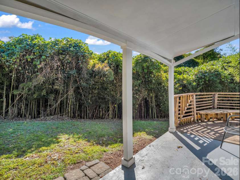 51 Shepherd Street, Tryon, NC 28782.  MLS# CAR4434123, YatesRealty ID 57136. Covered front porch and deck