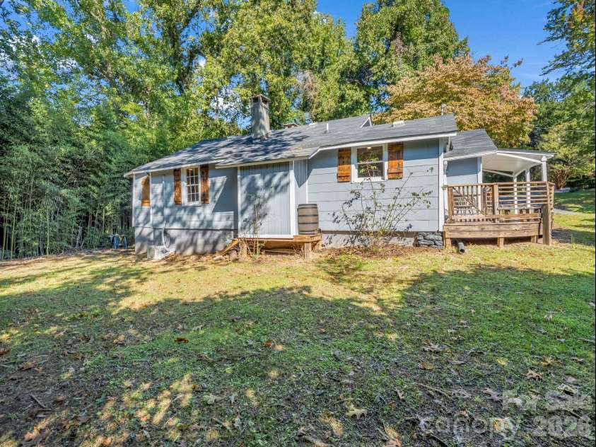 51 Shepherd Street, Tryon, NC 28782.  MLS# CAR4434123, YatesRealty ID 57136. Level yard