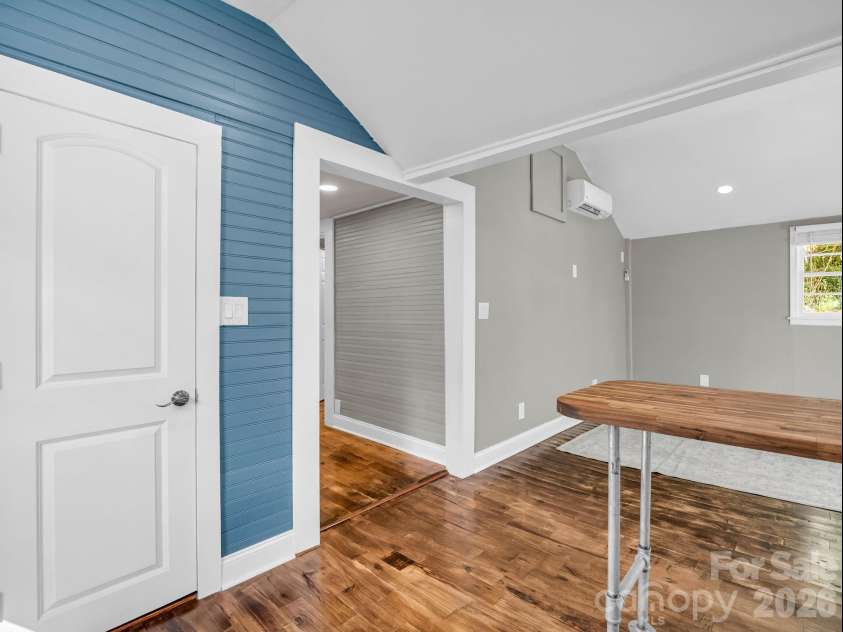 51 Shepherd Street, Tryon, NC 28782.  MLS# CAR4434123, YatesRealty ID 57136. Pantry door on the left