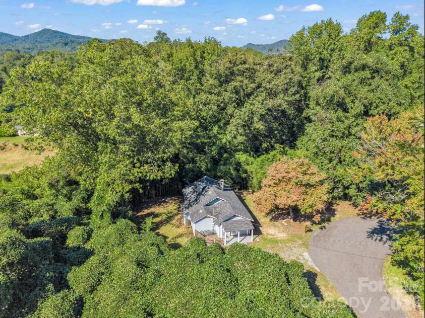 51 Shepherd Street, Tryon, NC 28782.  MLS# CAR4434123, YatesRealty ID 57136. Privacy