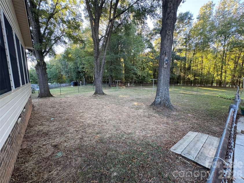 94 Tulip Avenue, Concord, NC 28025.  MLS# CAR4435284, YatesRealty ID 57141. Back yard