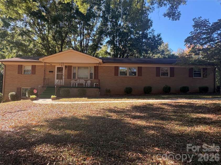 94 Tulip Avenue, Concord, NC 28025.  MLS# CAR4435284, YatesRealty ID 57141. Charming Full brick home front view