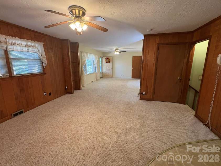 94 Tulip Avenue, Concord, NC 28025.  MLS# CAR4435284, YatesRealty ID 57141. Dining / Living Room